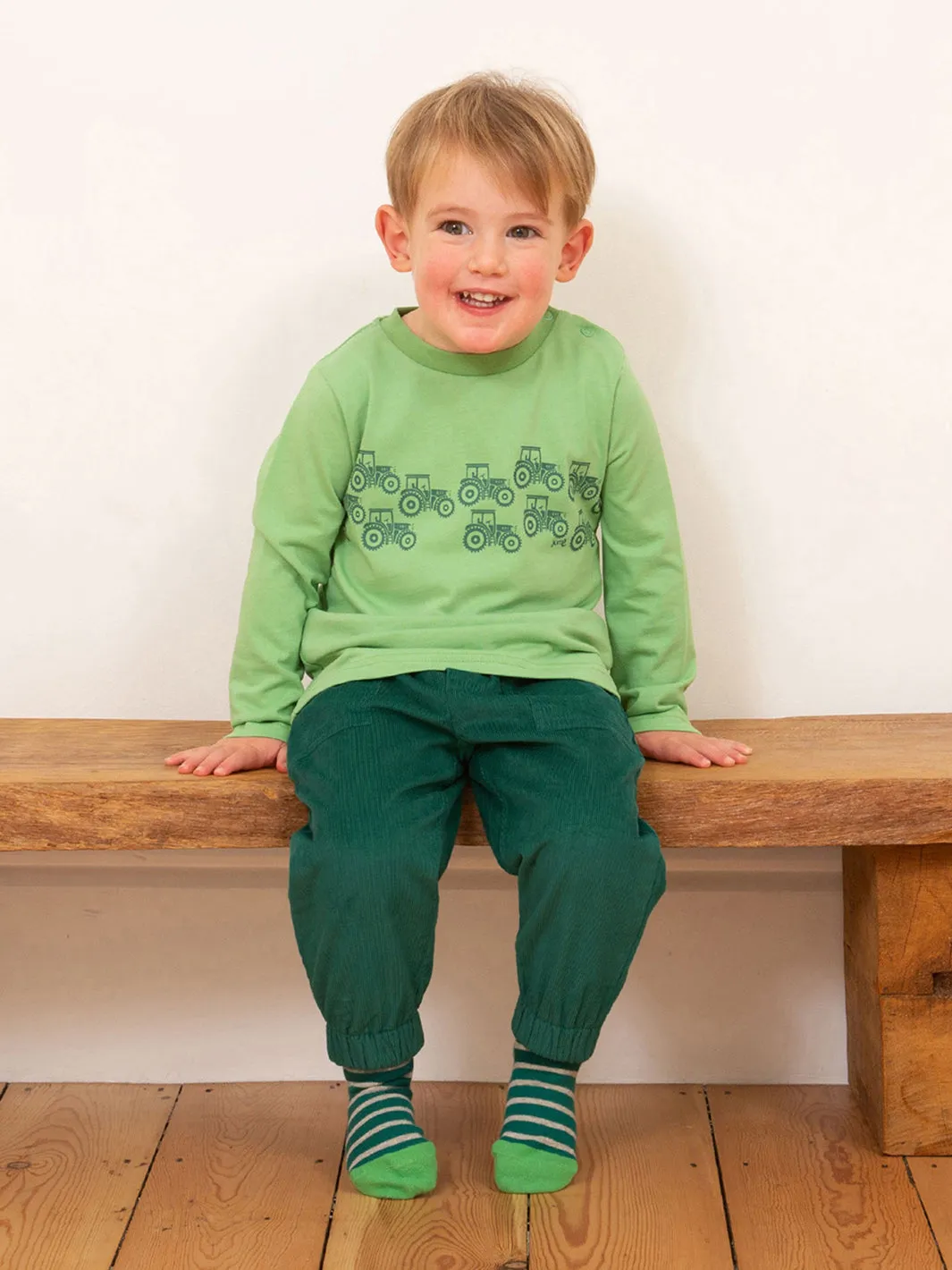 Kite Cosy cord pull ons green