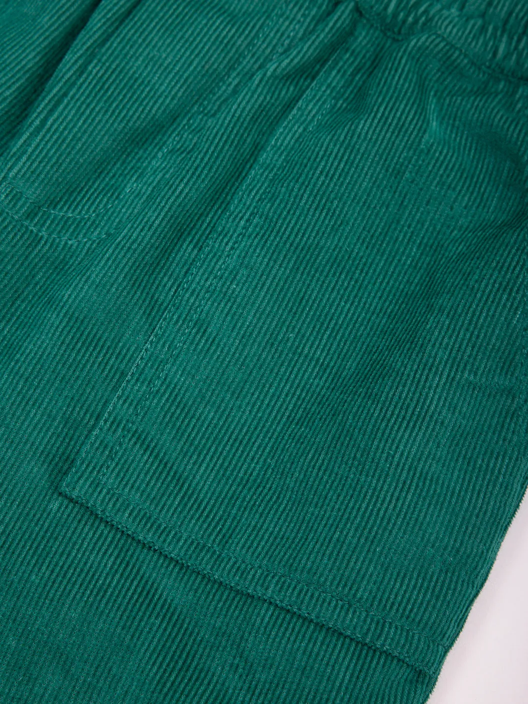 Kite Cosy cord pull ons green